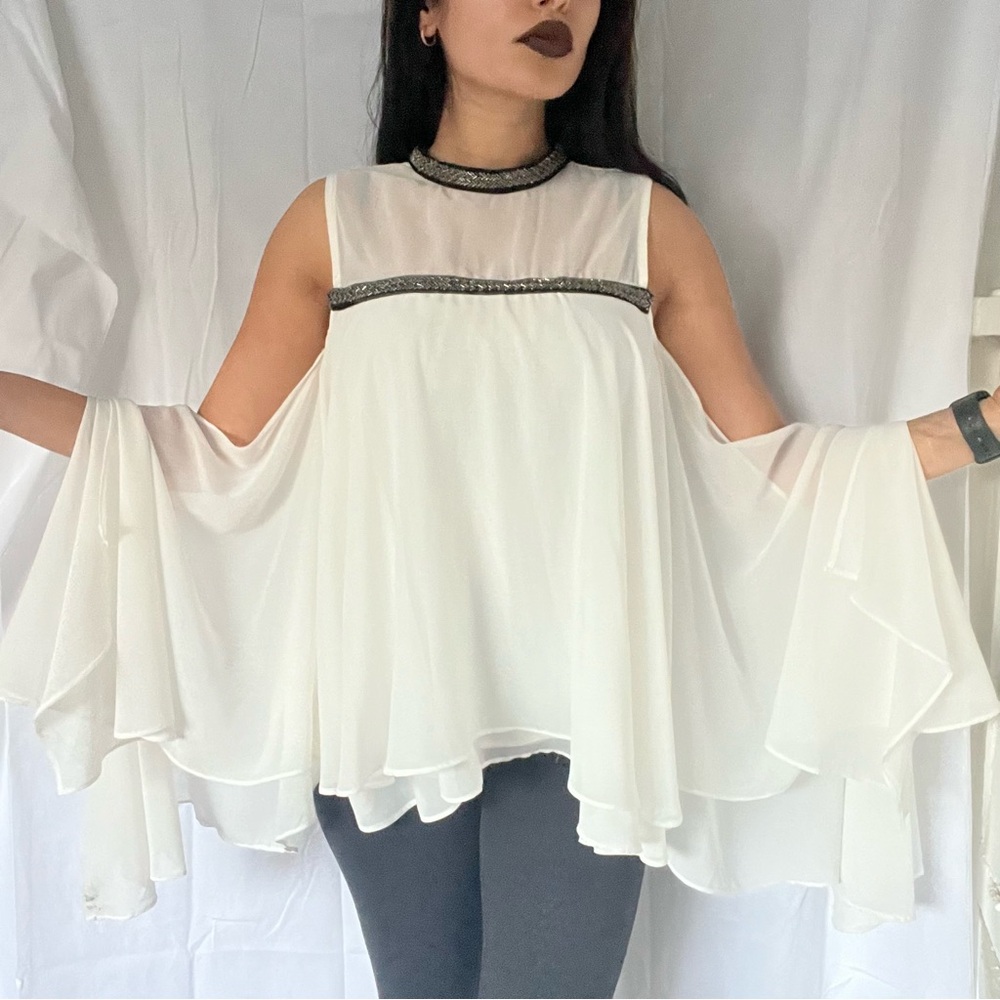Chic White Flowing Blouse with Black Trim